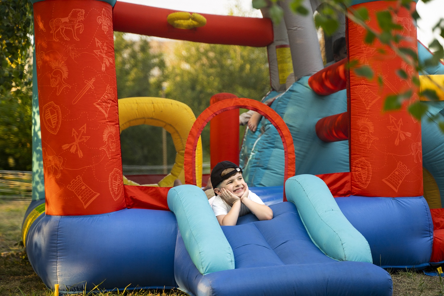 full-shot-smiley-kid-bounce-house